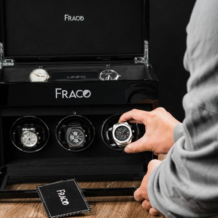 Showcasing a luxury watch collection in an elegant display case, perfect for timepiece enthusiasts and collectors.